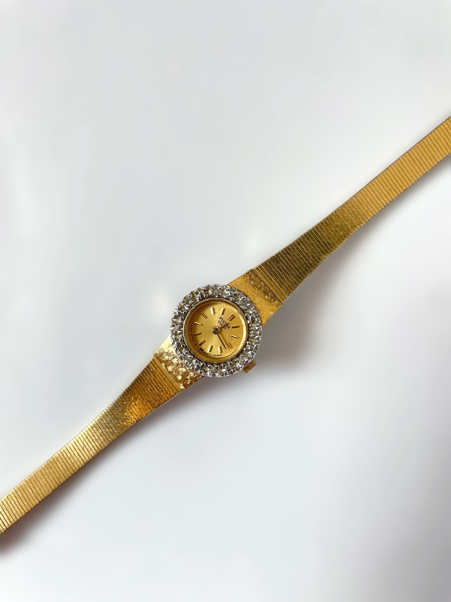 Gold Tone Pulsar Quartz Watch